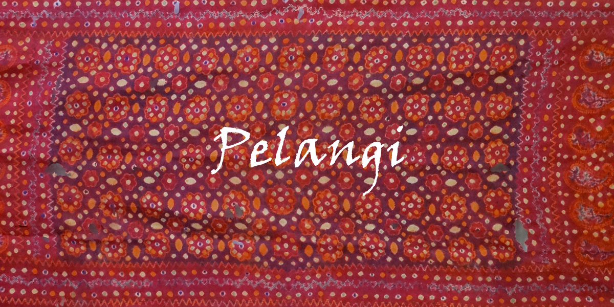 インドネシア・スマトラ島パレンバンの豪華シルク・織布・レッド 
